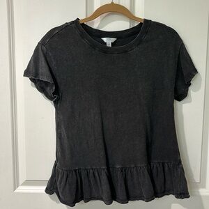 Small black/dark grey short sleeved T-shirt. Lightly worn. No tears and holes.